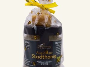 Mitbringsel aus der BioImkerei Rauscher mit Honigglas und Bienenwachskerze