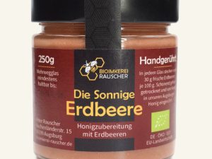 Die Sonnige Erdbeere von Bioimkerei Rauscher: Bio-Honigzubereitung mit Erdbeeren im 250-g-Glas, Vorderseite des Etiketts